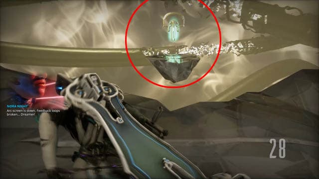 Warframe screenshot of a man in armor looking at a holographic amulet above a floating platform