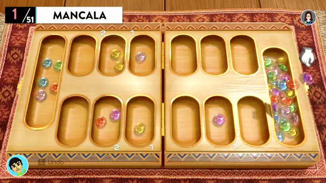 A Mancala game board with marbles in the boards sockets