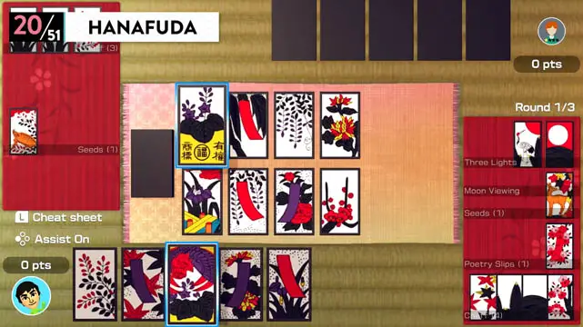 Hanafuda cards, colorful and with Japanese inspired designs, placed across a tabletop