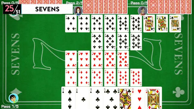 Dozens of cards placed on a green tabletop in a game of Sevens