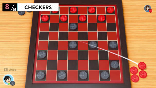 A checkers board with checkers placed on the board