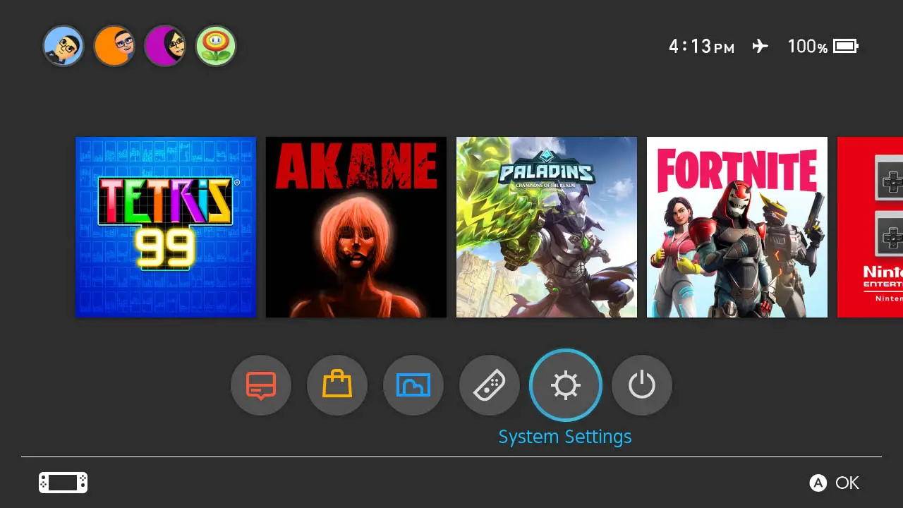 Game icons aligned in a row with the cog wheel below them highlighted from Nintendo Switch home screen screenshot