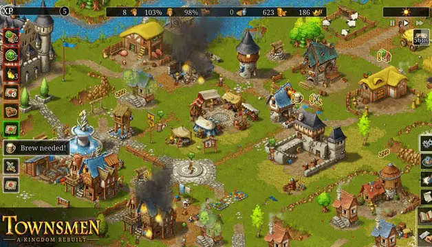 An overhead view of a green land and village huts from the game Townsmen
