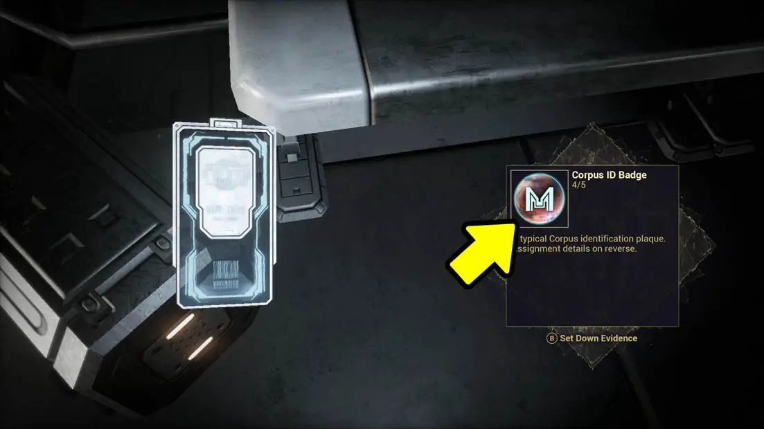 A keycard next to a message of the keycard with a yellow arrow pointing at the keycard's emblem