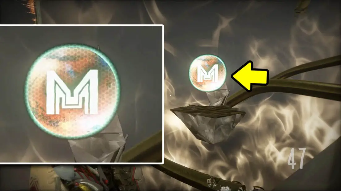 A close up of a orb with the letter M in it next to a platform with the orb hovering over it and a yellow arrow pointing at the platform