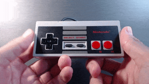 GIF of a hand pressing buttons on an NES controller