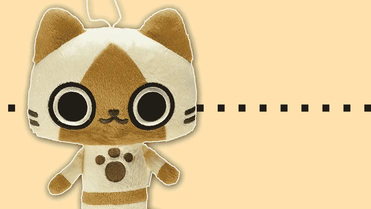 A cat plushie in front of a beige background