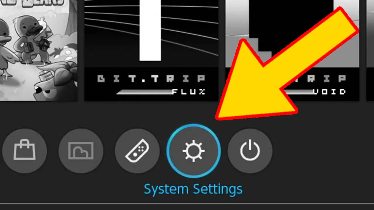 enu with a row of game icons and a yellow arrow pointing at a cog wheel