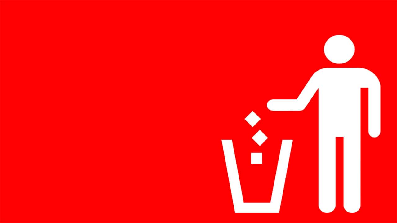 A red screen with a white outlien of a stick figure man tossing garbage into a garbage can