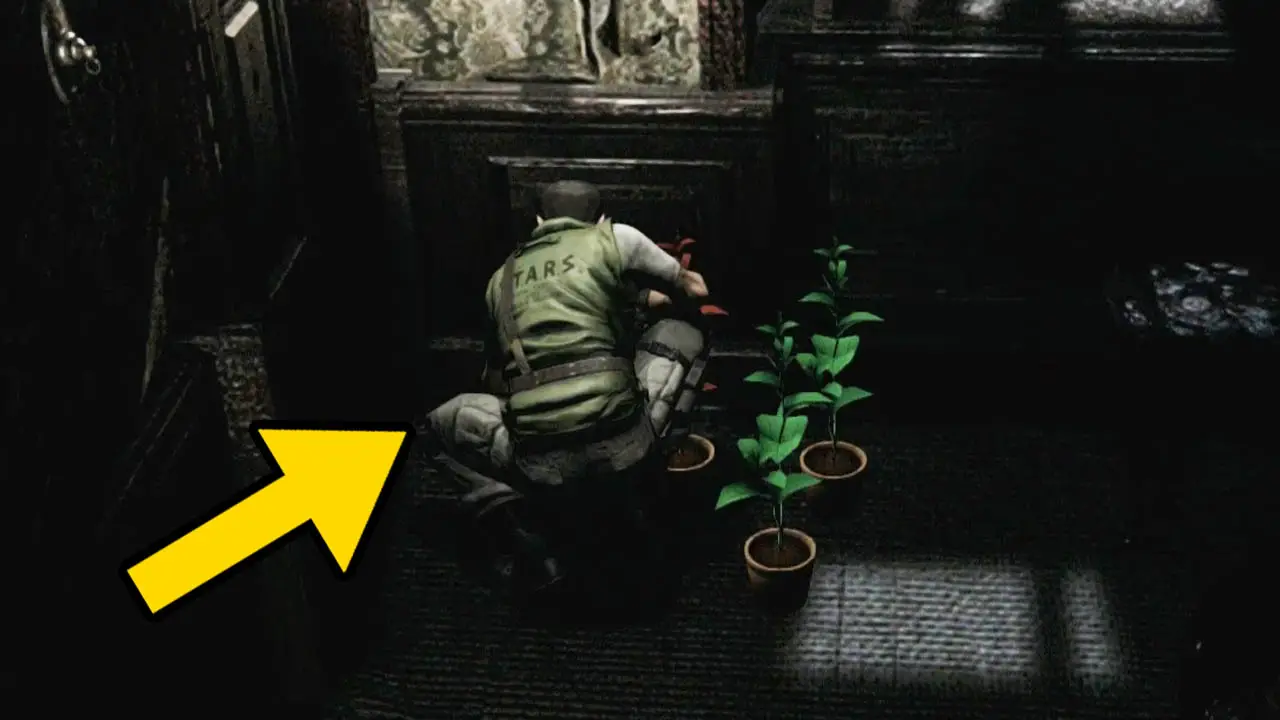 Chris kneeling over herbs with a yellwo arrow pointing at Chris (Resident Evil herb guide)