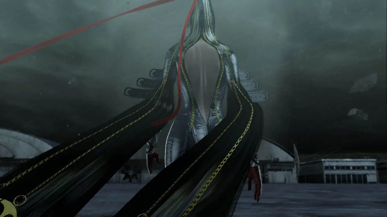 Bayonetta from behind, walking towards a tornado at night (bayonetta screenshot)