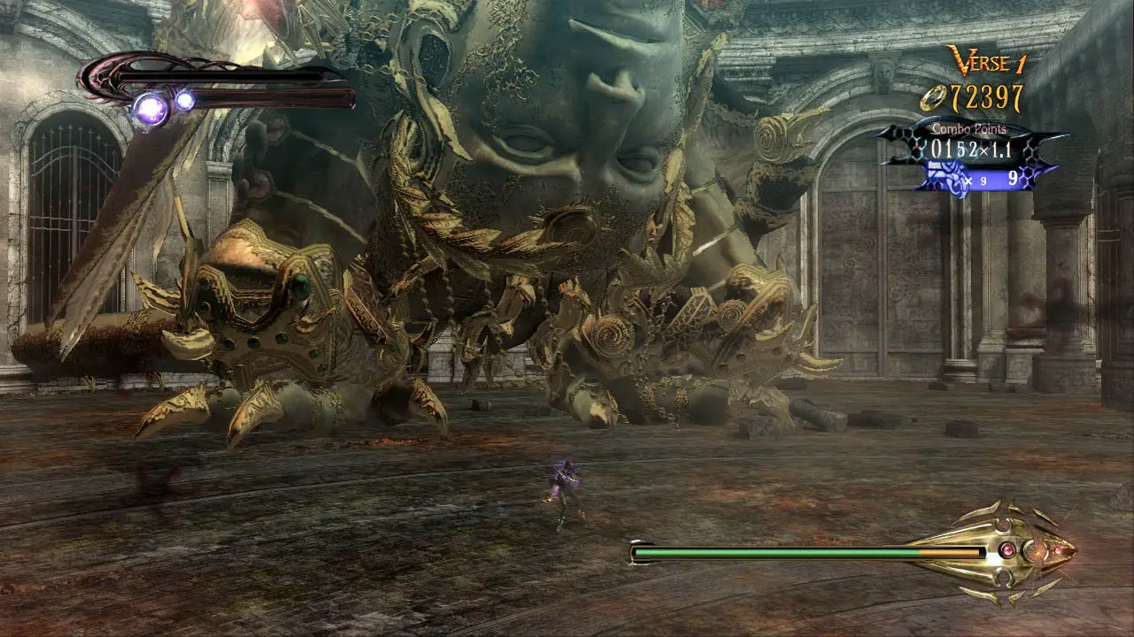 A giant upside down face creature in a large arena and Bayonetta standing at its feet (bayonetta screenshot)