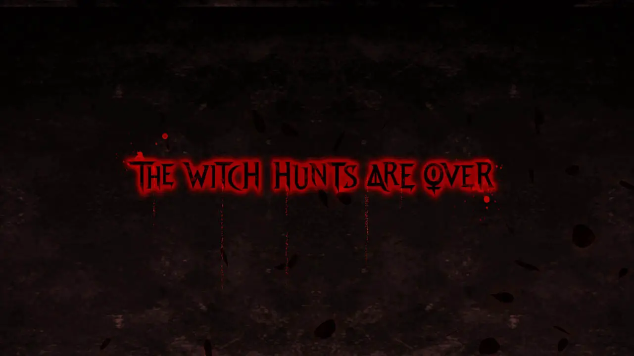 Black game over screen with the words "the witch hunts are over" in red font (bayonetta screenshot)