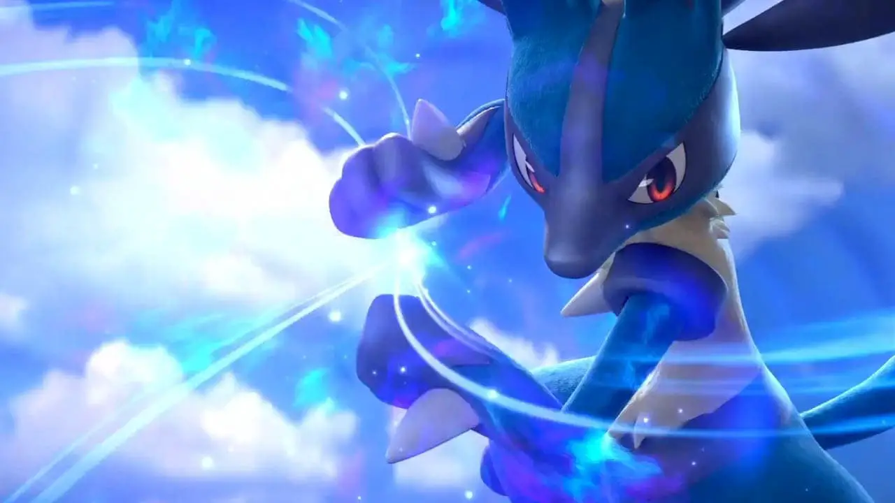 A blue pokemon fox with his hands together, with an energy ball in his hands (pokemon unite screenshot)