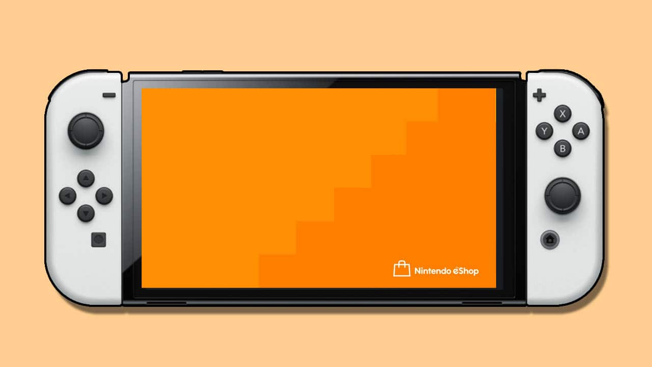 A Nintendo Switch OLED model with an orange loading screen against a peach background