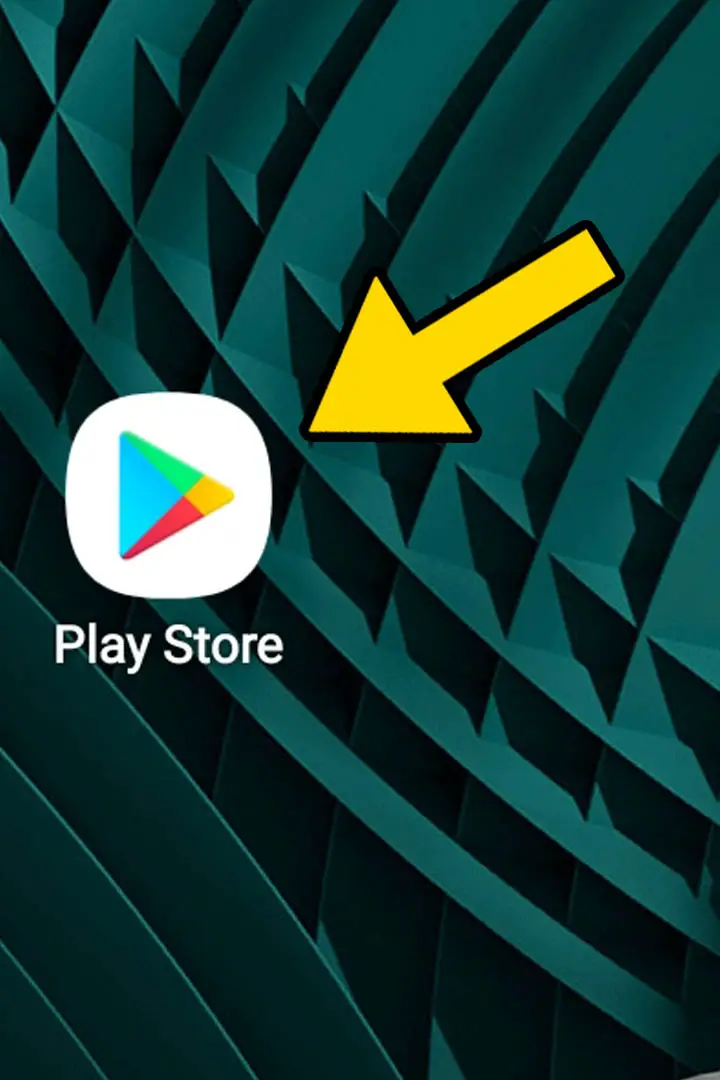 A google play store icon on a home screen with a yellow arrow pointing at it