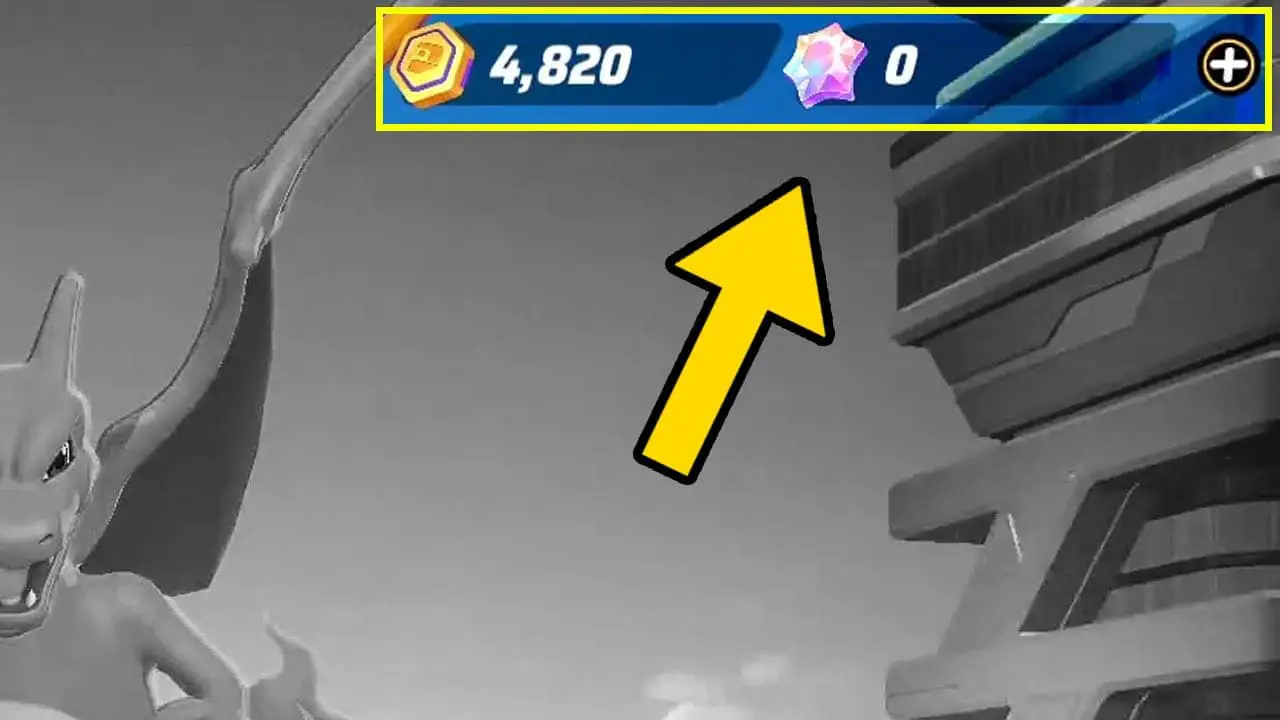 Blavck and white screen with a yellow arrow pointing at a pink gem (pokemon unite screenshot)