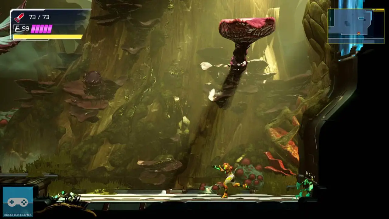 samus running through a rock cavern covered in foilage and greenery (metroid dread screenshot)